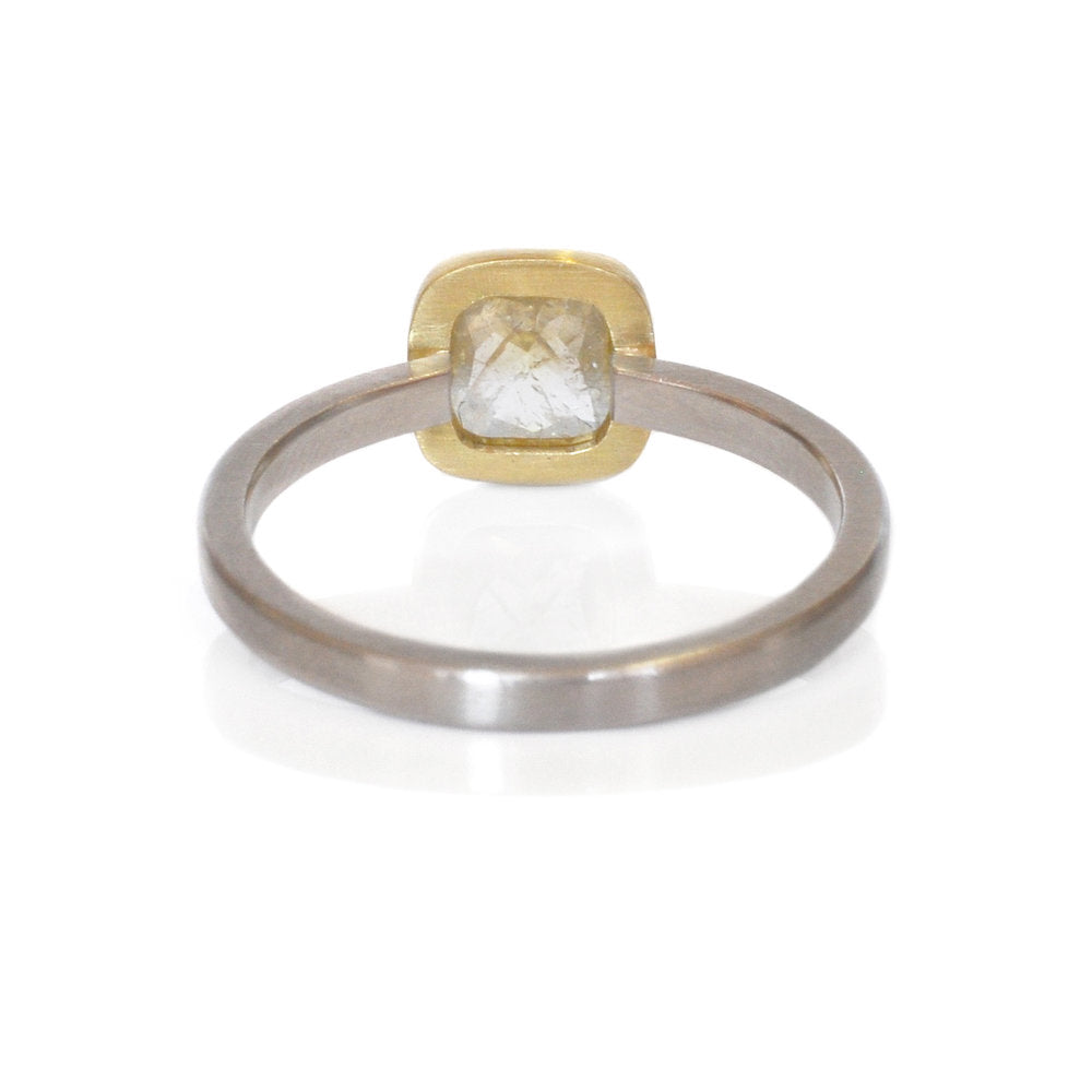 Open back bezel set yellow diamond ring. Made with recycled metal and conflict-free stone by EC Design in Minneapolis, MN.