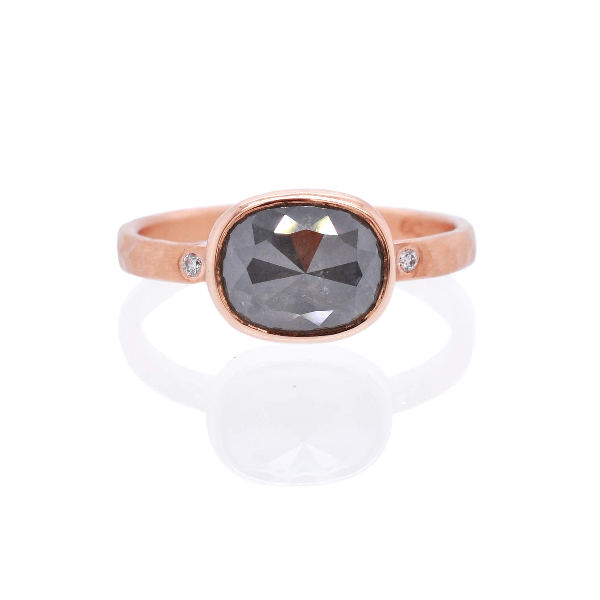 Cushion cut gray diamond in hammered rose gold with flush set diamond accents. Handmade by EC Design Jewelry in Minneapolis, MN using recycled metal and conflict-free stones.