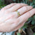 Hand hammered yellow gold band with bezel set round brilliant diamond. Handmade by EC Design Jewelry in Minneapolis, MN.