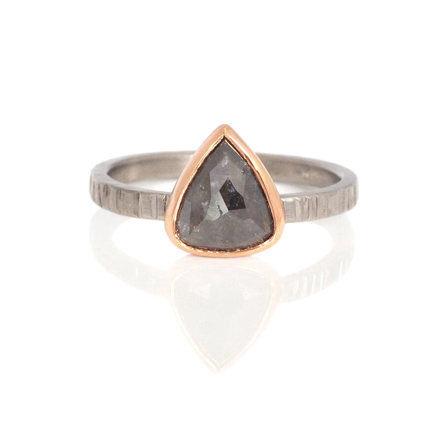 Dark gray diamond bezel set in red gold on a hammered palladium band. Handmade by EC Design Studio in Minneapolis, MN using recycled metal and conflict-free stone.