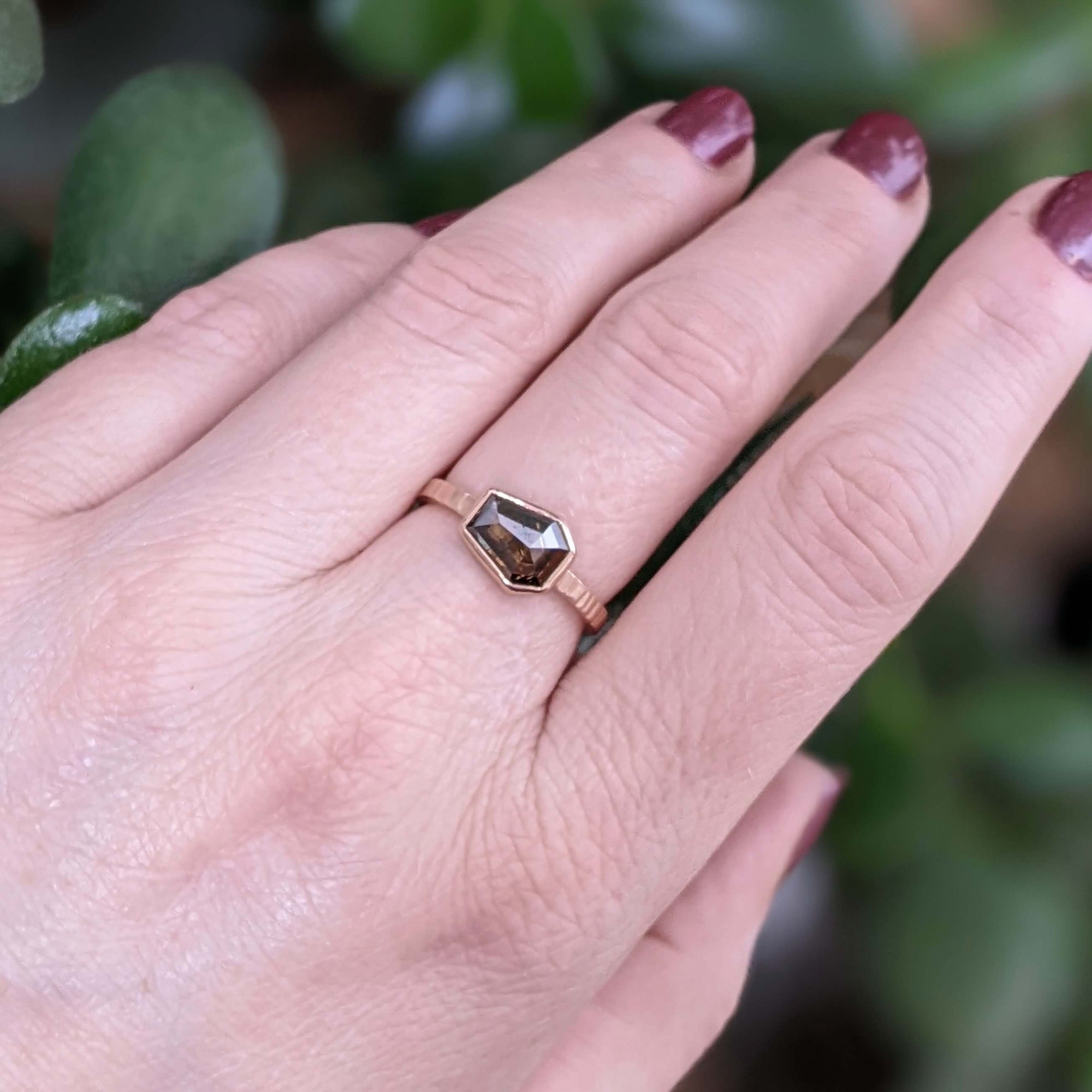 Coffin shaped cognac diamond on a linear hammered rose gold band. Handmade with recycled metal and conflict-free stone.