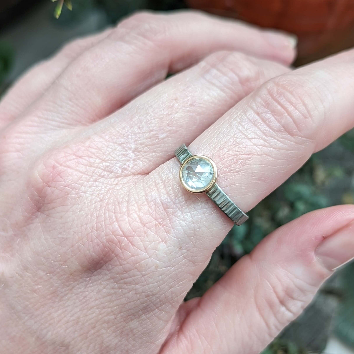 Rose cut white diamond engagement ring in palladium and rose gold.