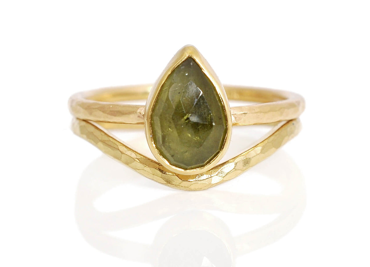 Handmade wedding set in yellow gold with a green rose cut sapphire solitaire. Handmade by EC Design in Minneapolis, MN using recycled metal and conflict-free stone.