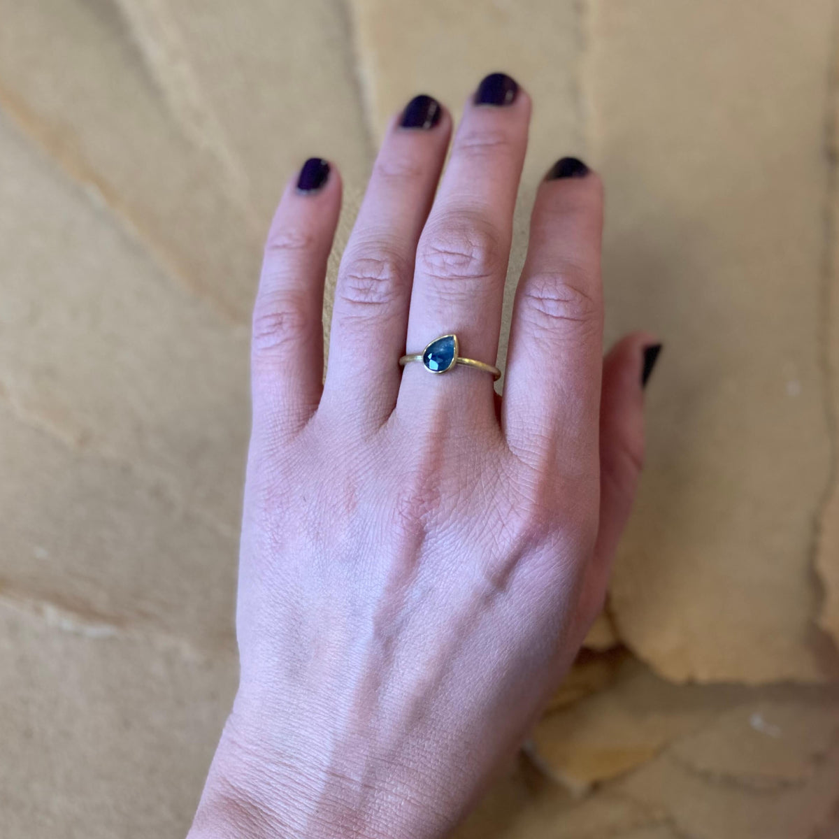 Blue rose cut sapphire engagement ring in 18k yellow gold. Handmade by EC Design Jewelry in Minneapolis, MN using recycled metal and conflict-free stone.