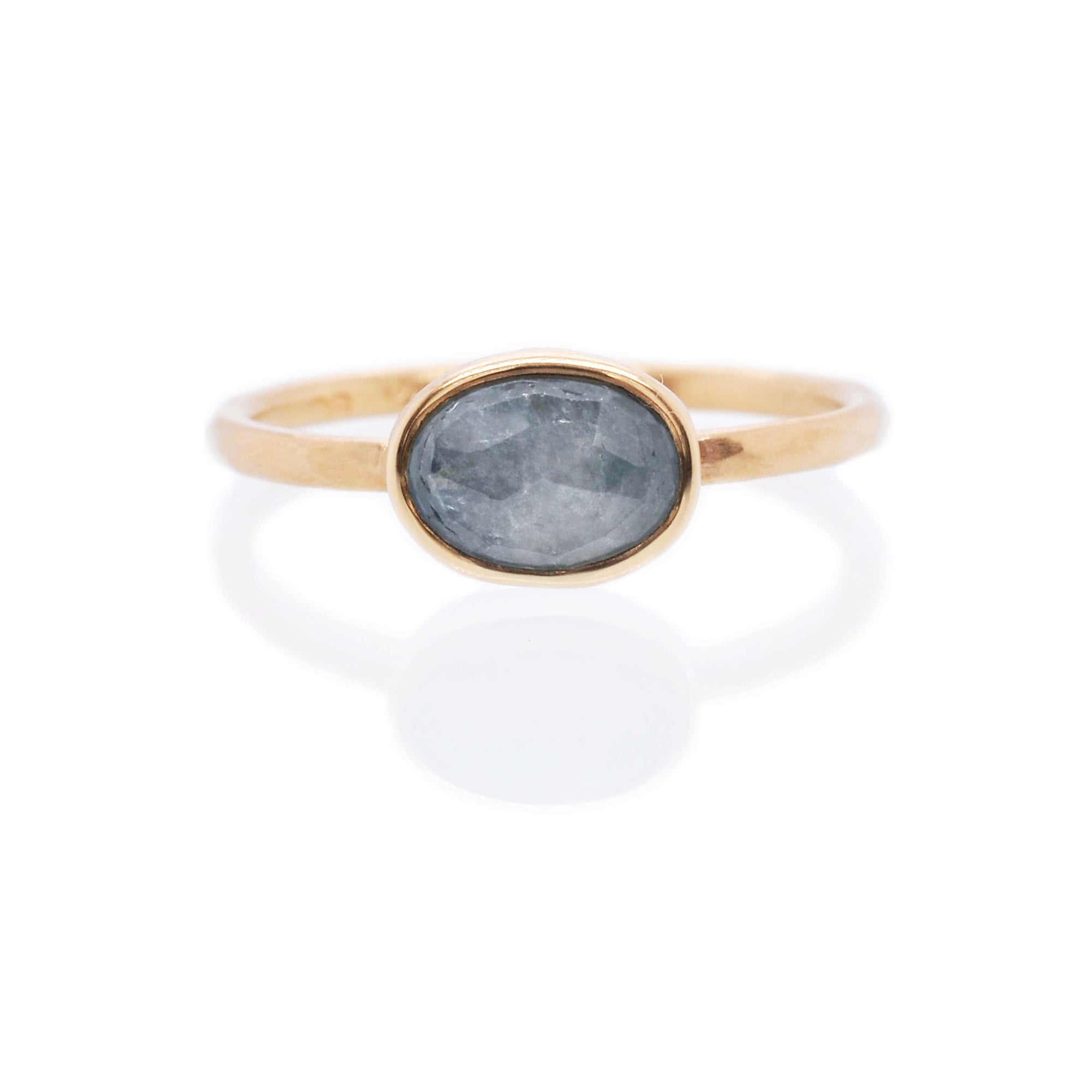 Low profile blue sapphire engagement ring in yellow gold. Handmade by EC Design Jewelry in Minneapolis, MN using recycled metal and conflict-free stone.