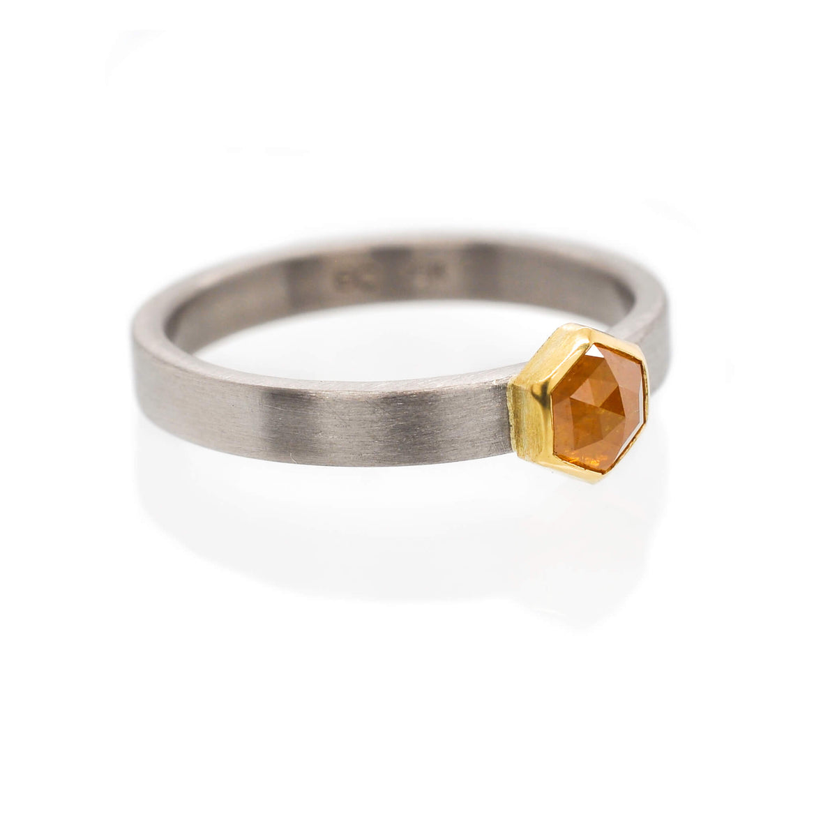 Hexagonal yellow diamond in yellow gold and palladium. Handmade with recycled metal and conflict-free stone. Created by EC Design Jewelry in Minneapolis, MN.