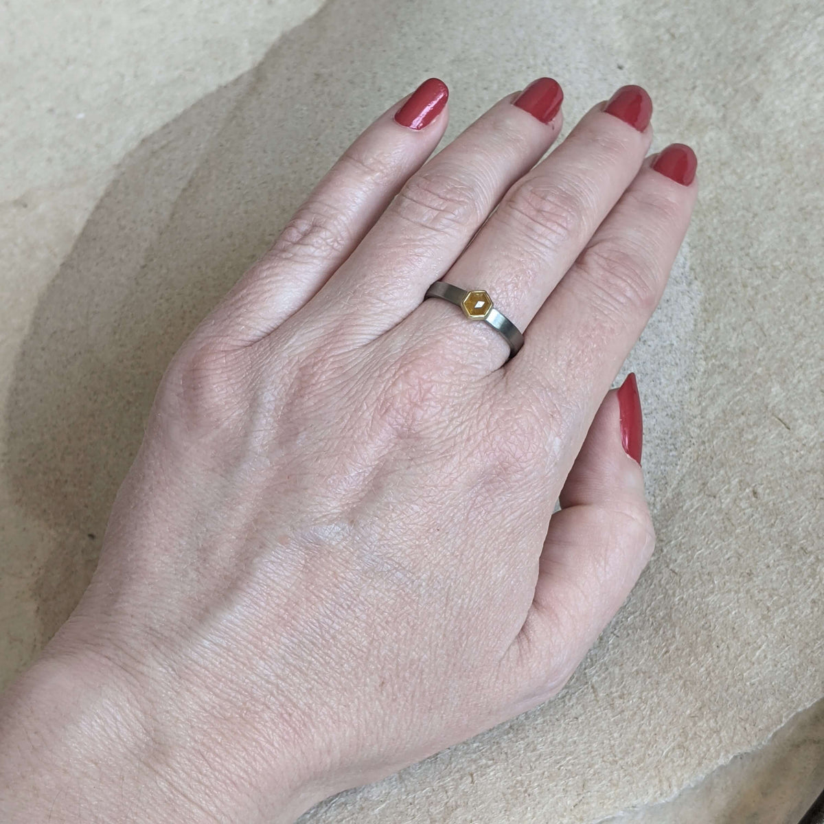 Hexagonal yellow diamond in yellow gold and palladium. Handmade with recycled metal and conflict-free stone. Created by EC Design Jewelry in Minneapolis, MN.