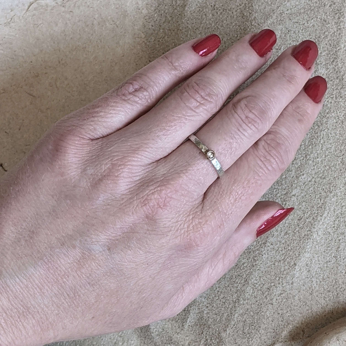 Sweet and simple sterling silver and champagne diamond engagement ring. Handmade with recycled metal and conflict-free stone.