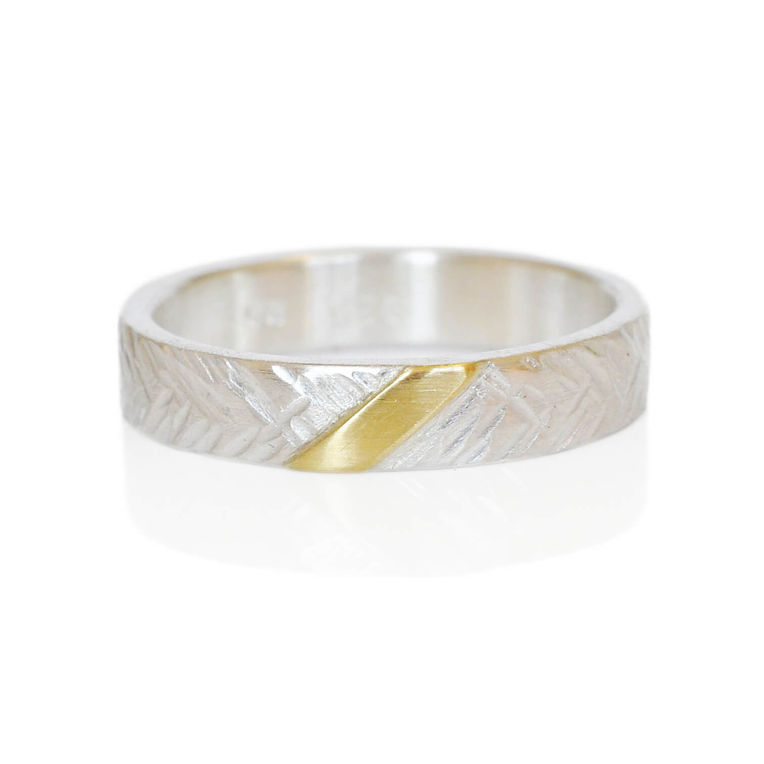 Hammered sterling silver yellow gold wedding band. Handmade with recycled metal.