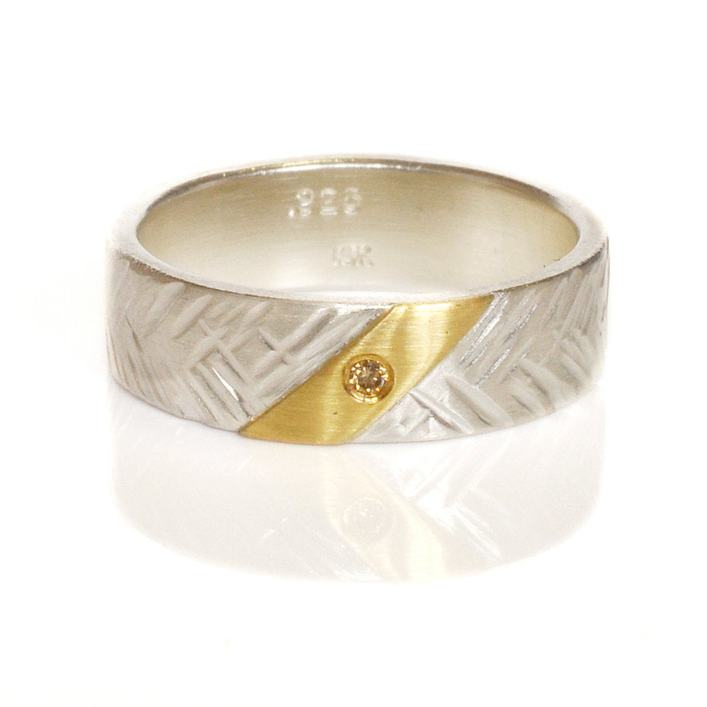 Wide hammered sterling silver band with yellow gold and champagne diamond accent. Handmade by EC Design Jewelry in Minneapolis, MN using recycled metal and conflict-free stone.