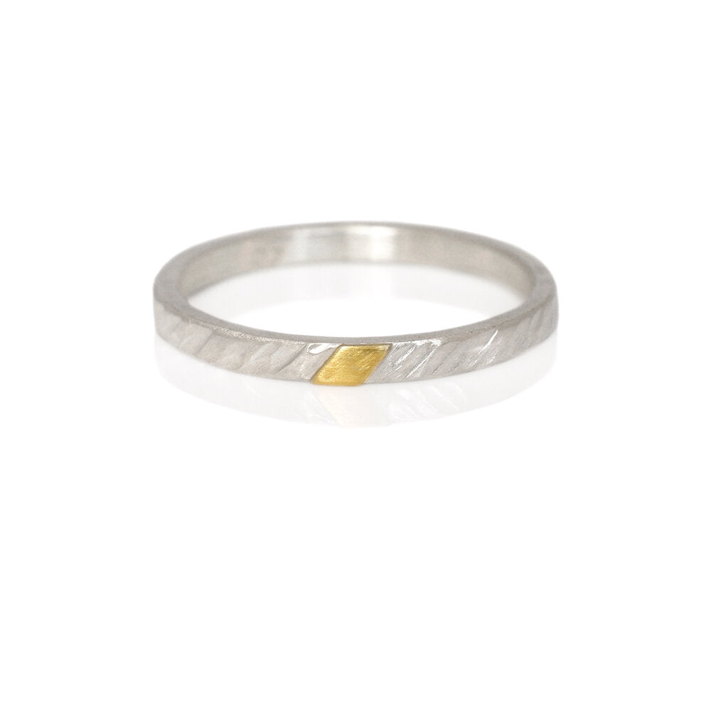 Handmade silver and yellow gold band. Made by EC Design Studio using recycled metals.