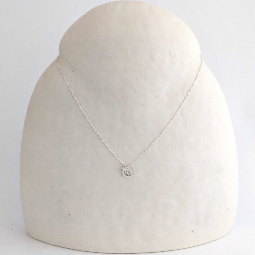 Sterling silver anatomical heart pendant from EC Design Jewelry in Minneapolis, MN. Handmade with recycled metal.