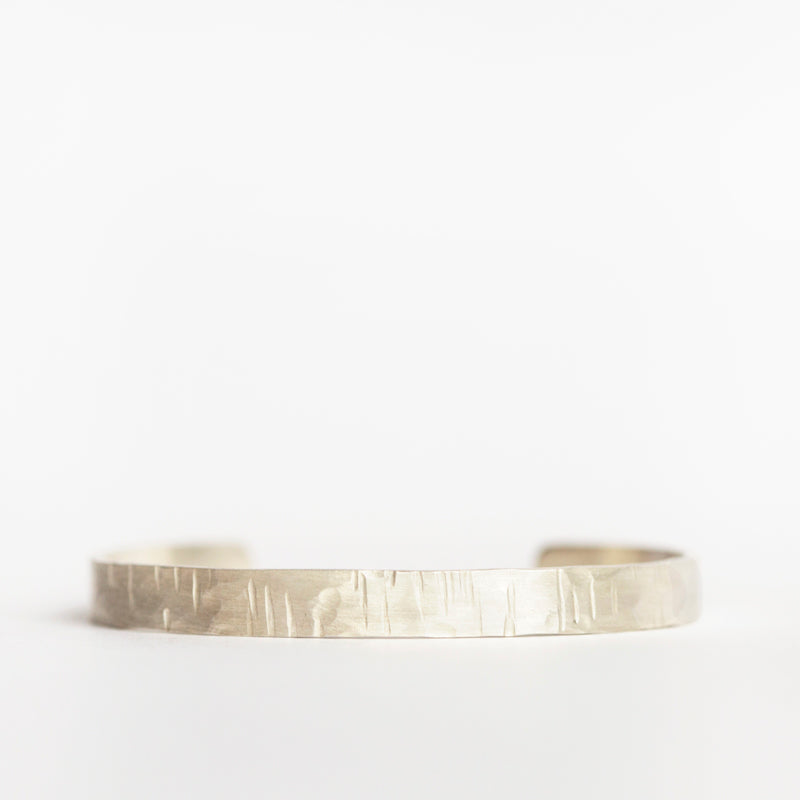 Random hammered sterling silver cuff. Handmade by EC Design Jewelry in Minneapolis, MN using recycled metal.