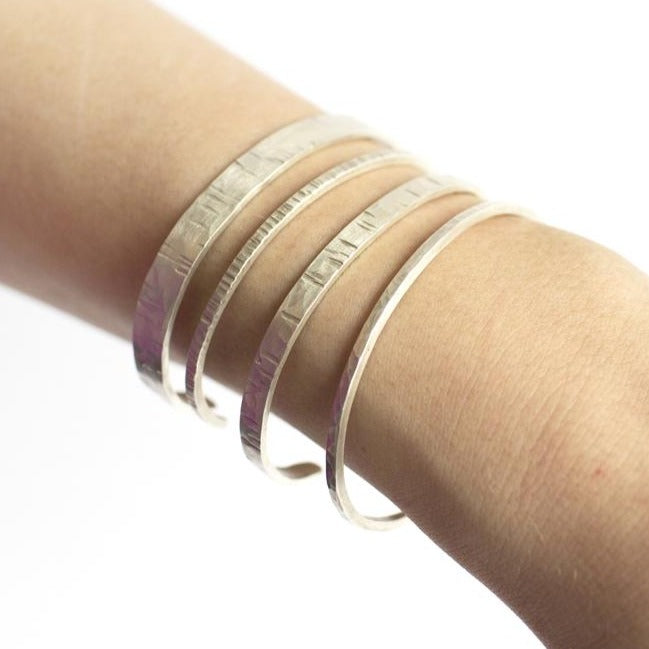 Sterling silver cuffs from EC Design in Minneapolis, MN.