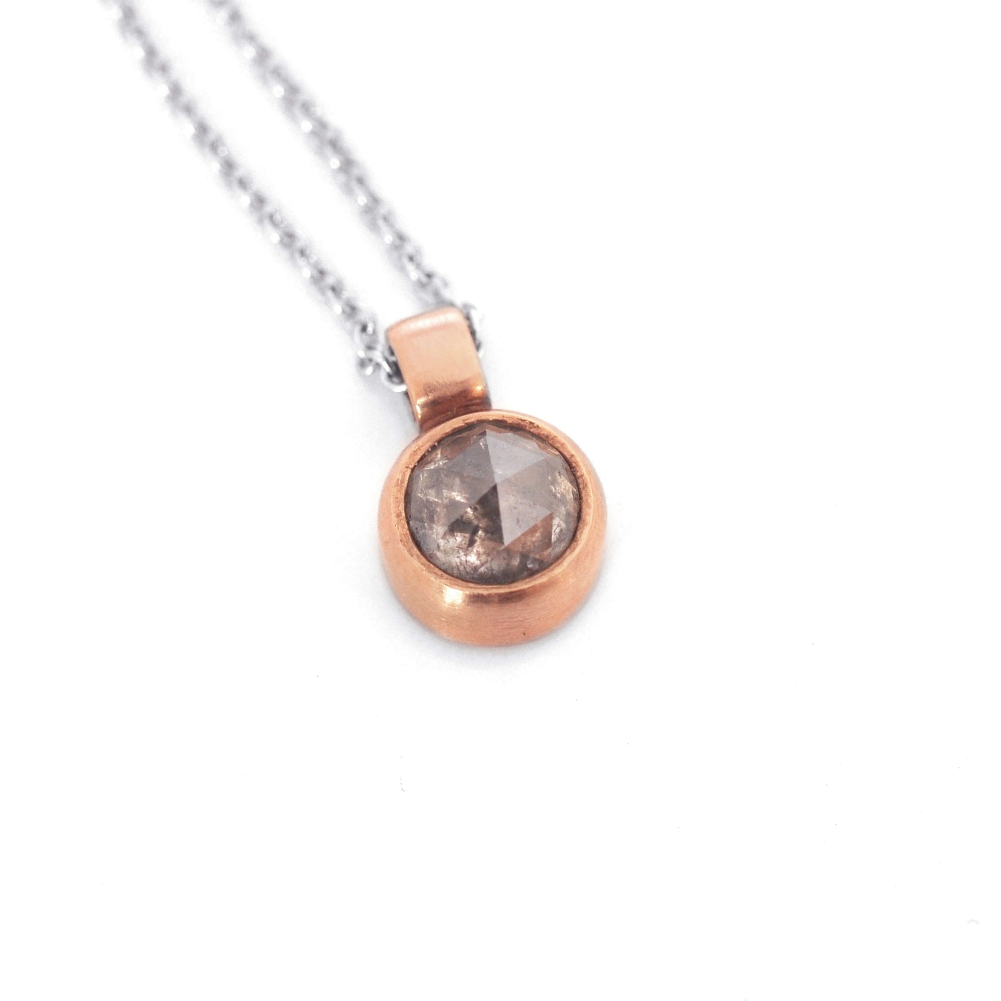 Salt and pepper diamond pendant in rose gold. Handmade by EC Design Jewelry in Minneapolis, MN using recycled metal and conflict-free stone.