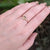 Handmade champagne diamond ring in red and yellow gold. Made with recycled metal and conflict-free stone. 