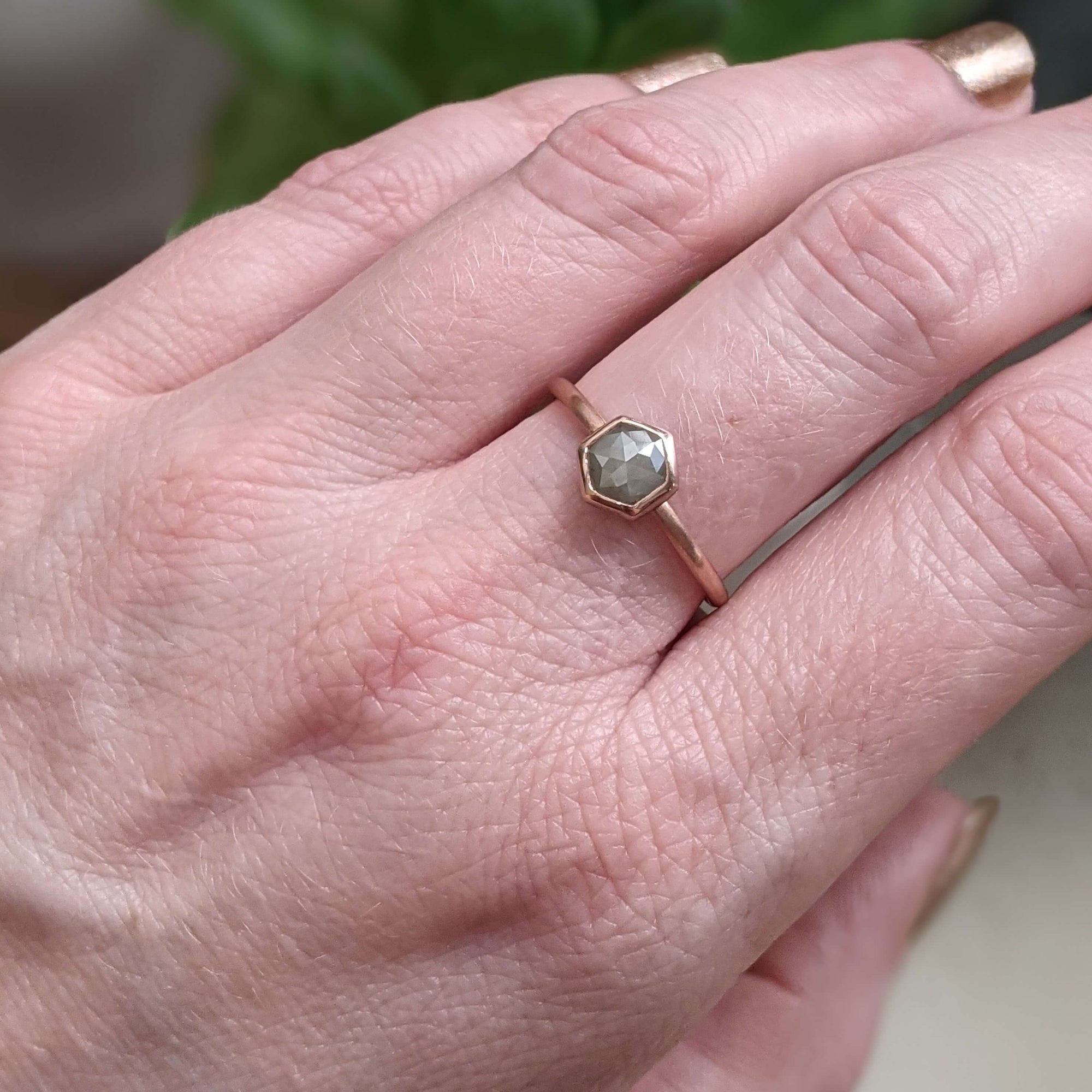 Gray rose cut hexagonal diamond in satin rose gold. Handmade by EC Design Jewelry in Minneapolis, MN using recycled metal and conflict-free stone.