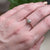 Gray rose cut hexagonal diamond in satin rose gold. Handmade by EC Design Jewelry in Minneapolis, MN using recycled metal and conflict-free stone.