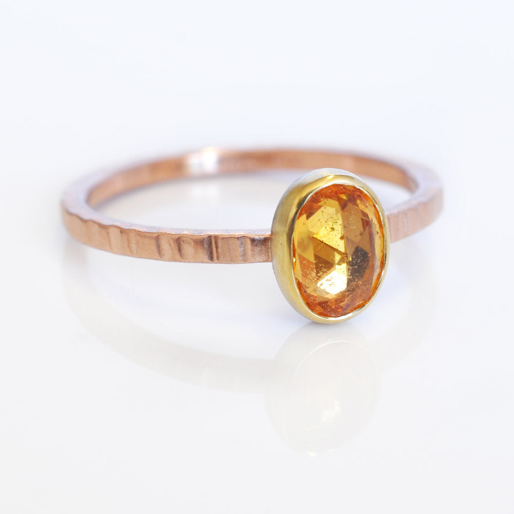 Orange rose cut sapphire in yellow and rose gold. Handmade with recycled metal and conflict-free stone by EC Design Jewelry in Minneapolis, MN.