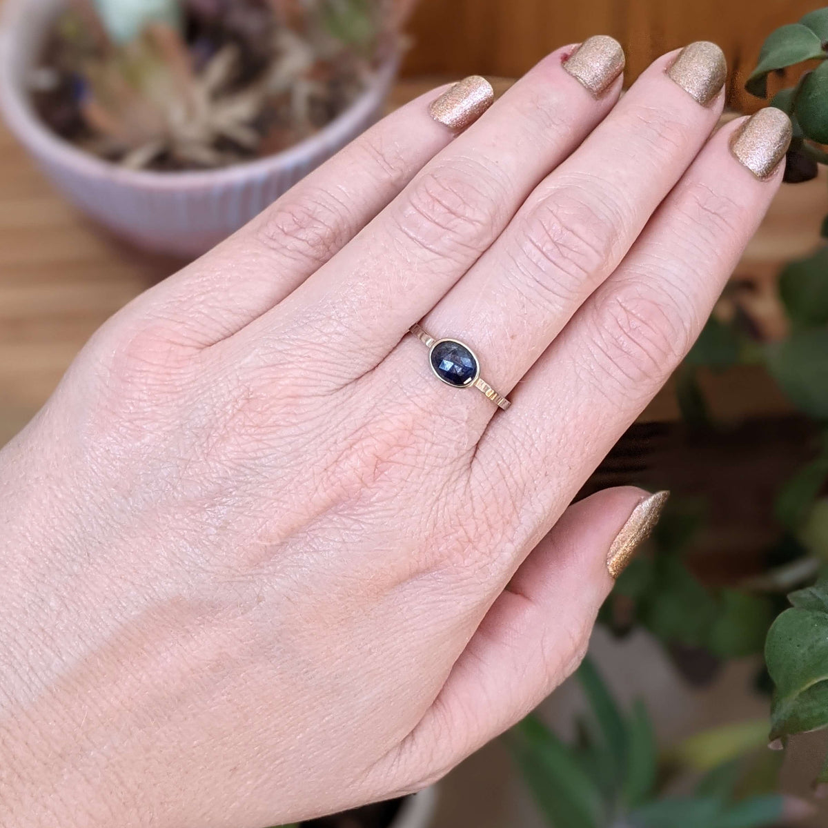 Deep blue sapphire engagement ring in white gold. Handmade by EC Design Jewelry in Minneapolis, MN using recycled metal and conflict-free stone.